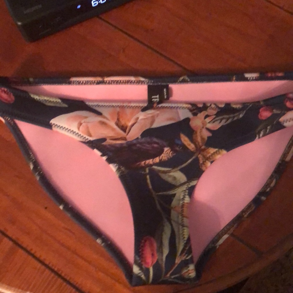 Triangl Floral bikini size medium. Only worn twice